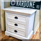 F21. White end table or nightstand. 